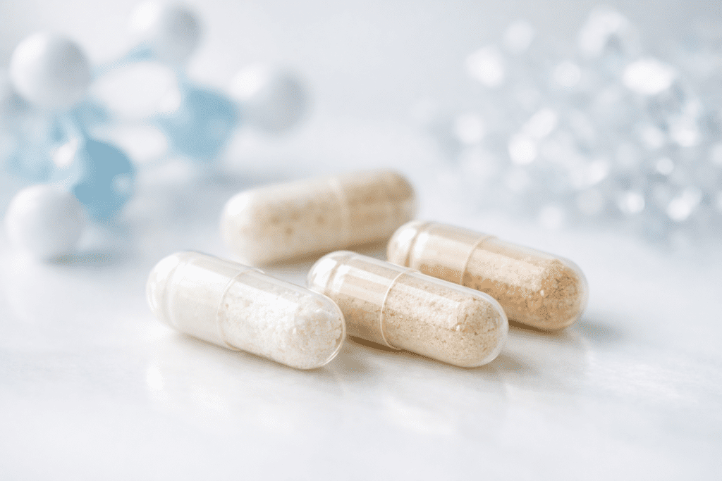 Supplement brands comparison: macro view of vitamin capsules with molecular structures representing premium supplement quality standards